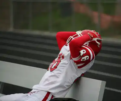 A young frustrated football player